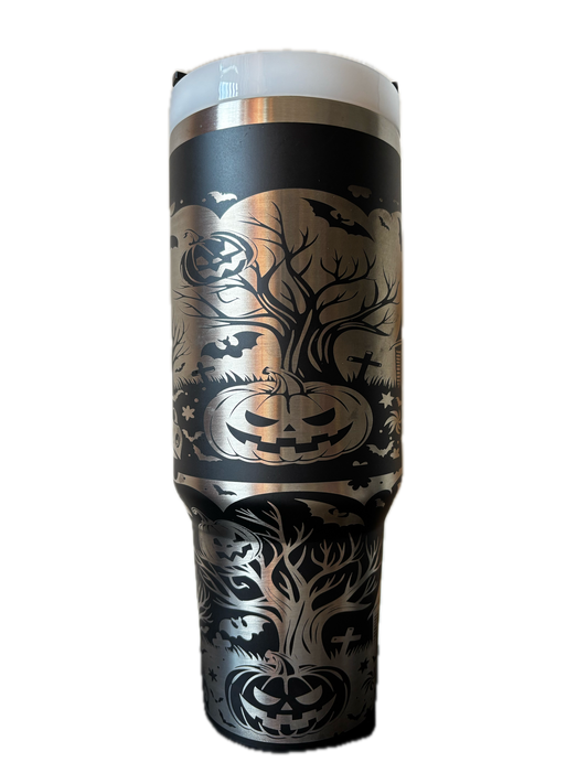 Black tumbler with Halloween-themed design